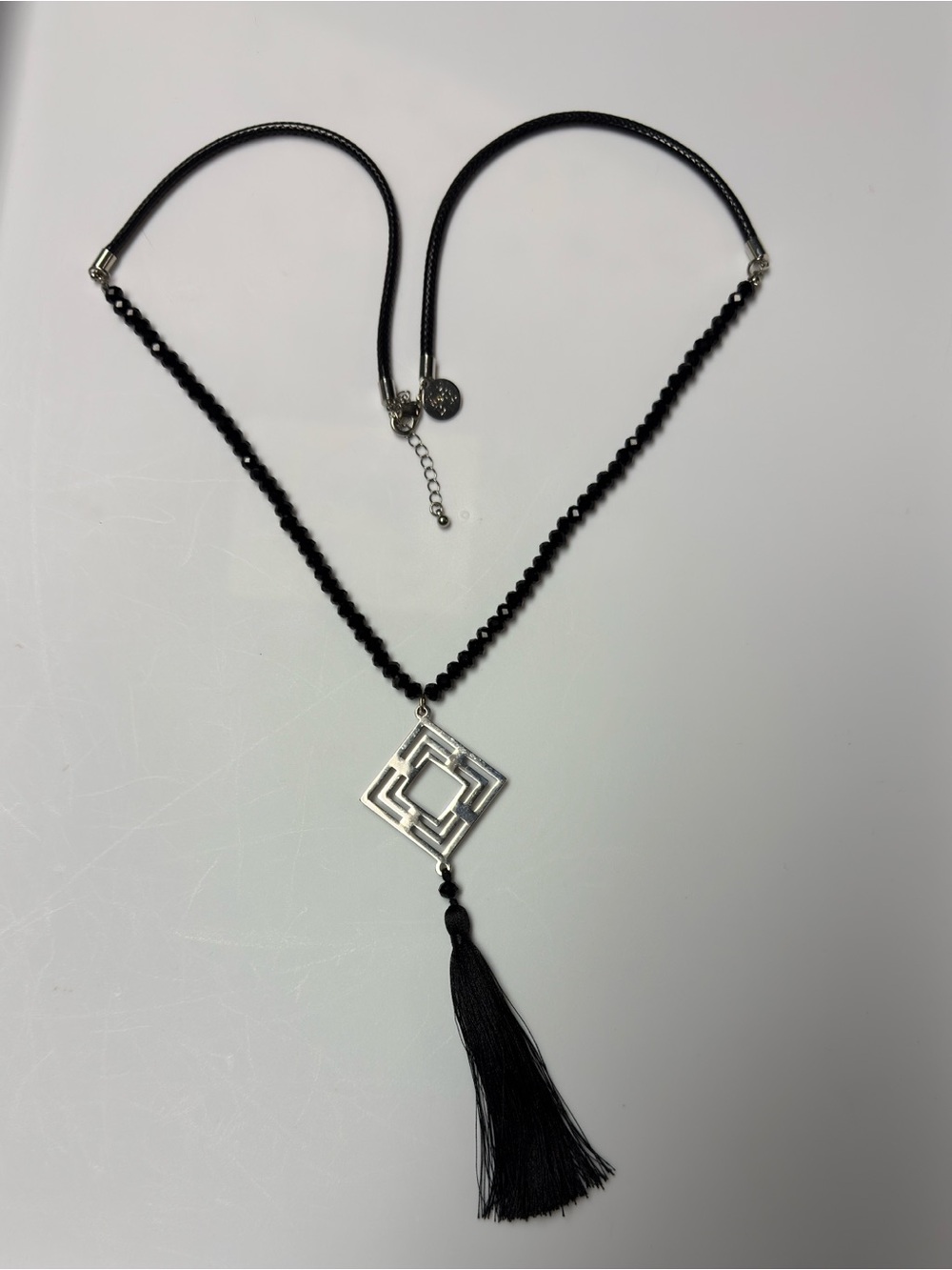 White House Black Market (WHBM) Silvertone Black Crystal Tassel Necklace.